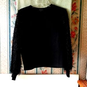 Gracia Sweater with sparkle and fringe sleeves.